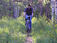 2004.06.12 Bicycle riding in a forest.