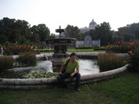 2016.09.16 Sitting on the border of a pond with a fountain in the People Garden (Volksgarten) of Vienna.