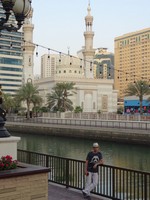 2018.05.31 An example of a harmonious combination of modern urban architecture with traditional religious one (mosques) along al Kasba channel in Sharjah.