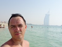 2018.06.01 That famous 3-stars sail-shaped hotel, with which everyone takes photos being in Dubai, in the haze of the summer day heat does not look as bright as on postcards.