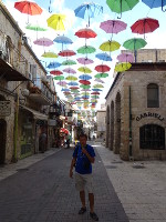 2018.09.07 Over the street of Yoel Moshe Salomon in Jerusalem there are colored umbrellas hanging, just like in the Portuguese city of Agueda in 2011 (where the tradition is from).