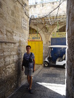 2018.09.08 Through the narrow streets of the Old City of Jerusalem you can move either on foot or by some mini transport like a golf car.