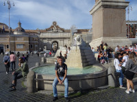 2019.10.04 Sitting on 1 of the 4 bowls of the Obelisk Fountain (Fontana dell'Obelisco) in the center of People's Square (Piazza del Popolo) in Rome.