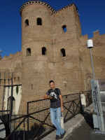 2019.10.05 It seems that this is a castle but in fact just a gate with towers called Porta Asinaria, a part of the Aurelian Walls (Mura Aureliane) of Rome.