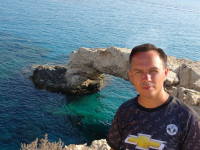 2021.07.29 Against the background of the “Kraken's Arch” – a coastal rock arch near the Kraken's Cave in Ayia Napa.
