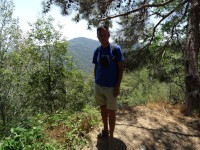 2021.07.30 Against the background of mountain and green landscape, a few meters from the Kykkos Monastery (Ιερά Μονή Κύκκου).