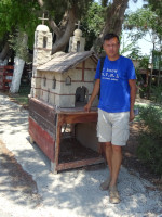 2021.08.01 Next to an unexpected model of an unknown Greek cathedral by a cafe near the Kolossi Castle (Κάστρο Κολοσσίου, 1210) on Cyprus.