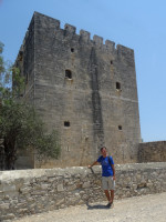 2021.08.01 Against the background of the medieval castle of Kolossi (Κάστρο Κολοσσίου, 1210) on Cyprus, rear view.