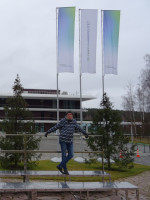 2021.11.14 The only one on the benches for group photographs, but with the flags of “SberUniversity” and against the background of its buildings.