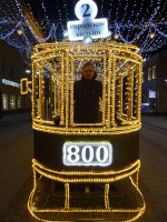 2022.03.16 Only late in the evening the “carriage driver” of the “golden” tram on Bolshaya Pokrovskaya Street in Nizhny Novgorod (Russia) saw how beautiful it was with lighting, and that it was of the route #2 “City Ring” (while 800 is the age of the city).