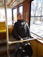 2022.03.17 Inside a tram (this time a real one) of Nizhny Novgorod (Russia), at a strange steering wheel 🤔, puffing up with pride, in a vertical frame.